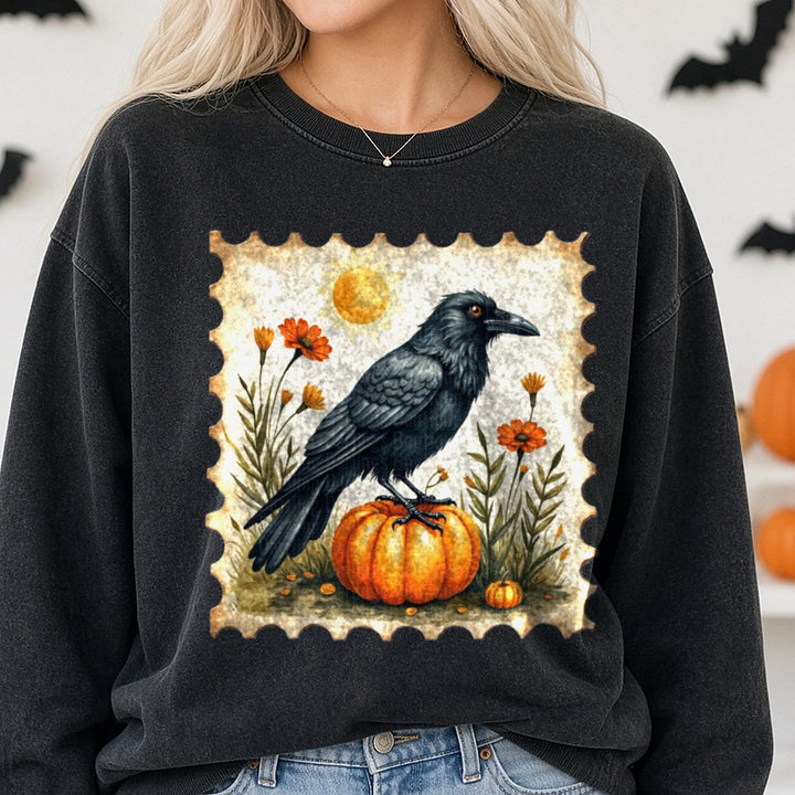 Halloween Fall Black Crow Pumpkin Stamp DTF transfer shown on a Comfort Colors sweatshirt