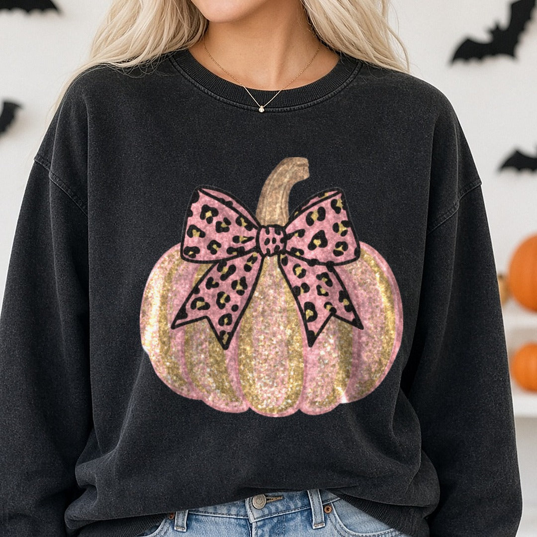 Halloween Fall Pumpkin Pink Glitter Leopard Bow DTF transfer shown on a Comfort Colors sweatshirt