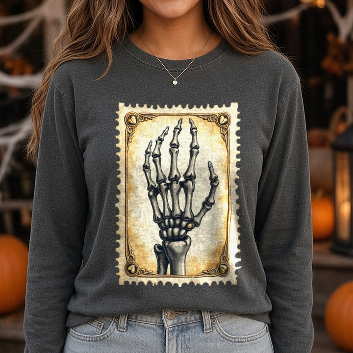Halloween Fall Skeleton Hand Stamp DTF transfer shown on a Comfort Colors long sleeve tee