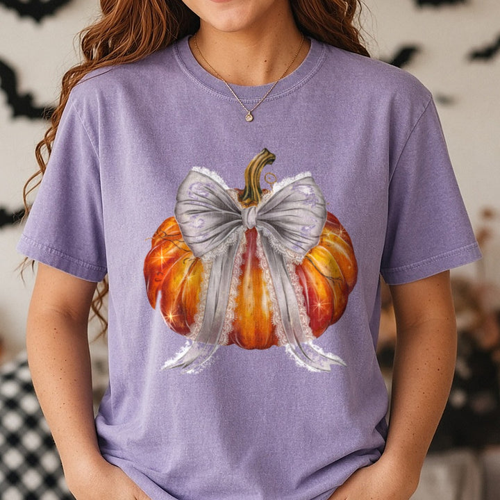 Halloween Fall Pumpkin Orange Silver Coquette Bow DTF transfer shown on a Comfort Colors tee