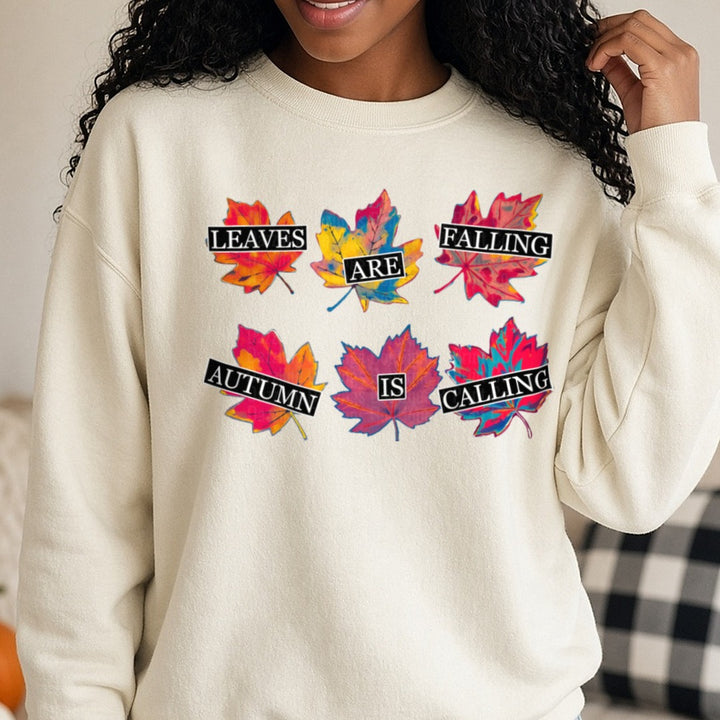 Halloween Fall Leaves Are Falling DTF transfer shown on a Comfort Colors sweatshirt