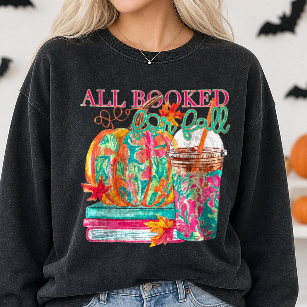 Halloween Fall Pumpkin All Booked for Fall DTF transfer shown on a Comfort Colors sweatshirt