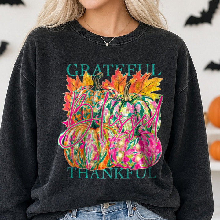 Halloween Fall Pumpkin Grateful Blessed Thankful Floral DTF transfer shown on a Comfort Colors sweatshirt