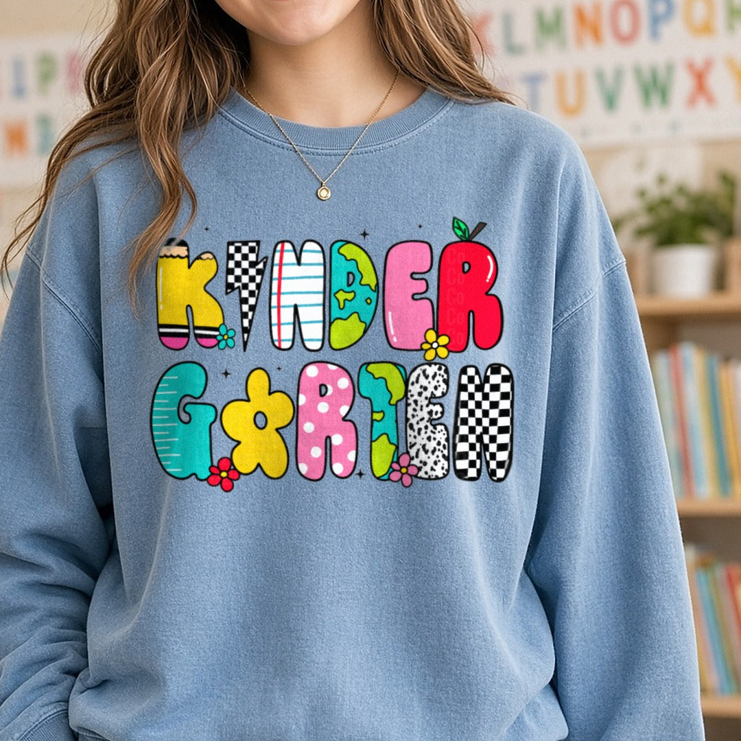 Back to School Teacher Kinder DTF transfer shown on a Comfort Colors sweatshirt