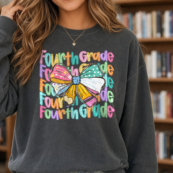 Back to School Teacher Fourth Grade DTF transfer shown on a Comfort Colors sweatshirt