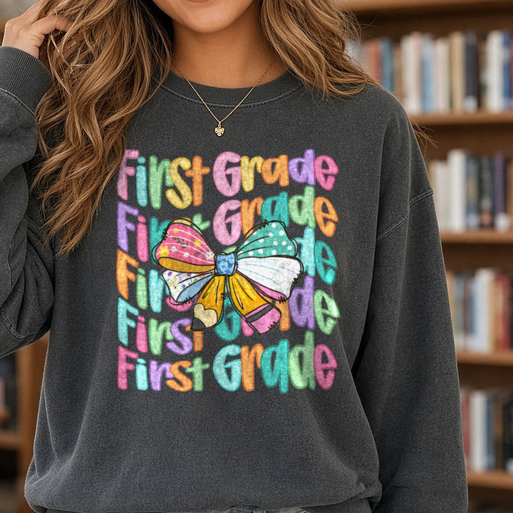 Back to School Teacher First Grade DTF transfer shown on a Comfort Colors sweatshirt