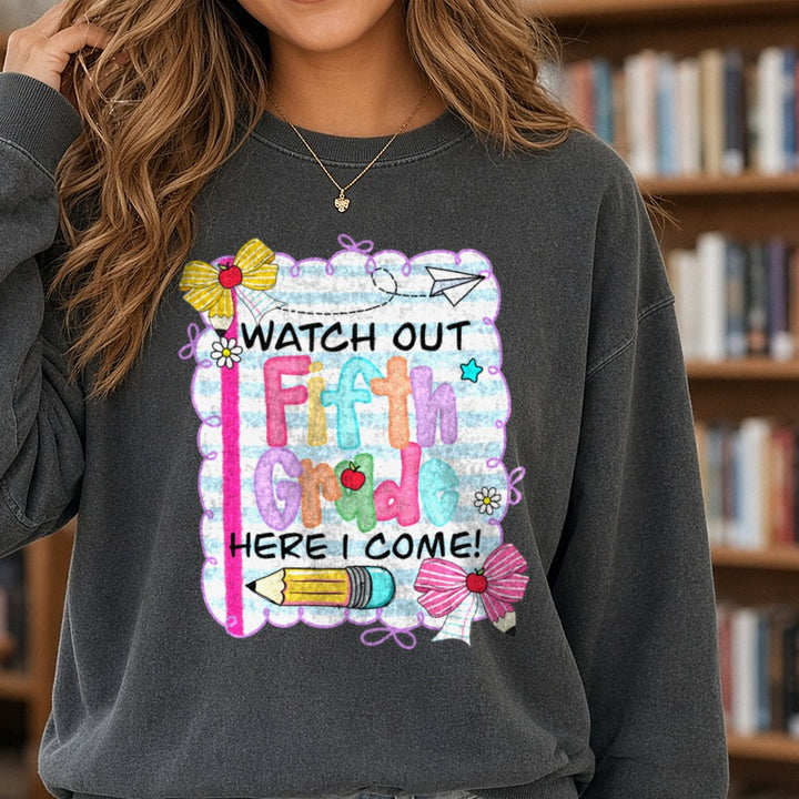 Back to School Teacher Watch Out Fifth Grade DTF transfer shown on a Comfort Colors sweatshirt