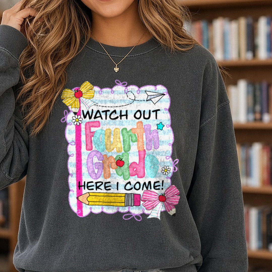 Back to School Teacher Watch Out Here I Come Fourth Grad DTF transfer shown on a Comfort Colors sweatshirt