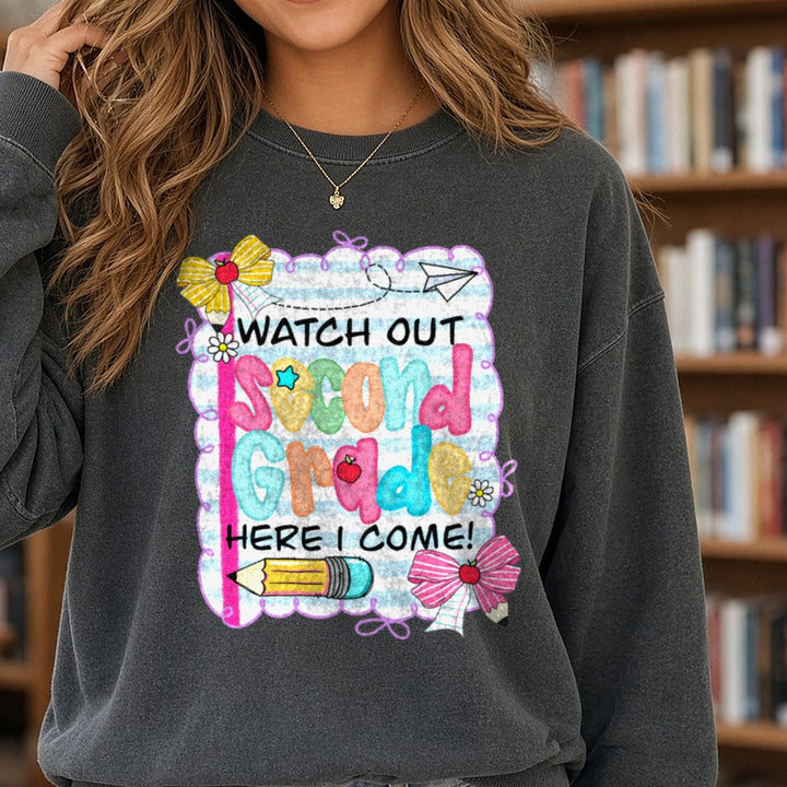 Back to School Teacher Watch Out Here I Come Second Grade DTF transfer shown on a Comfort Colors sweatshirt