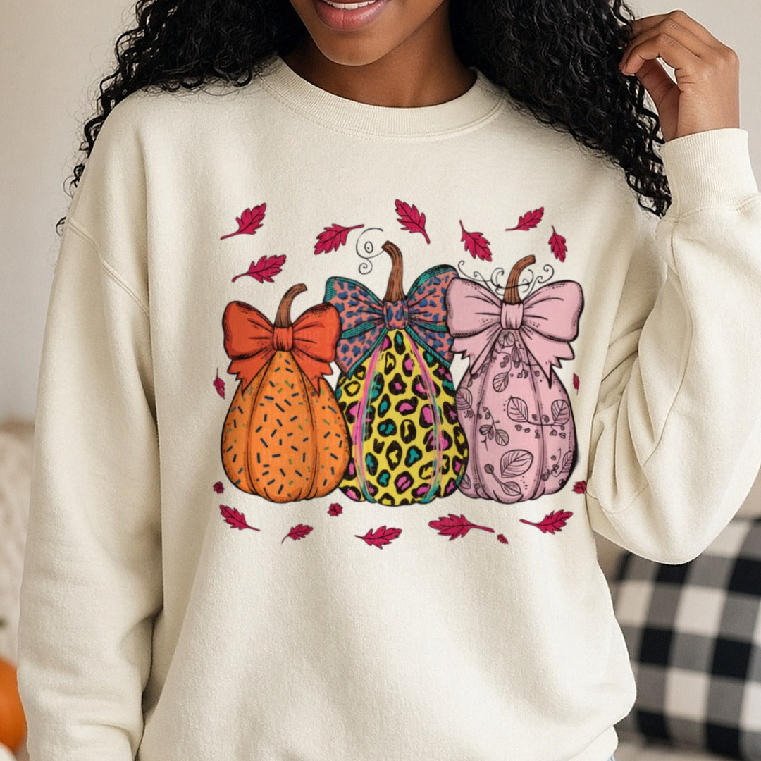 Halloween Fall Pumpkins Trio DTF transfer shown on a Comfort Colors sweatshirt