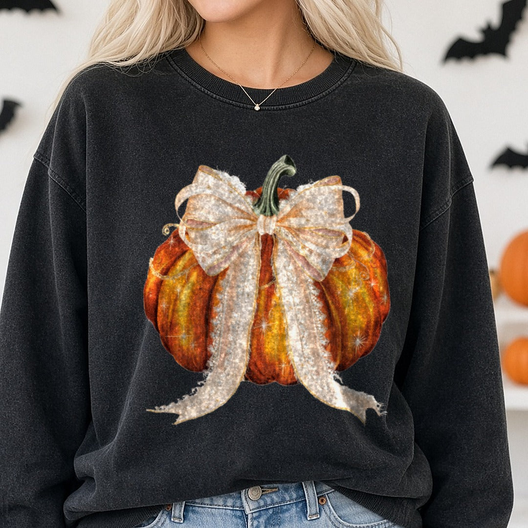 Halloween Fall Pumpkin Coquette Bow DTF transfer shown on a Comfort Colors sweatshirt