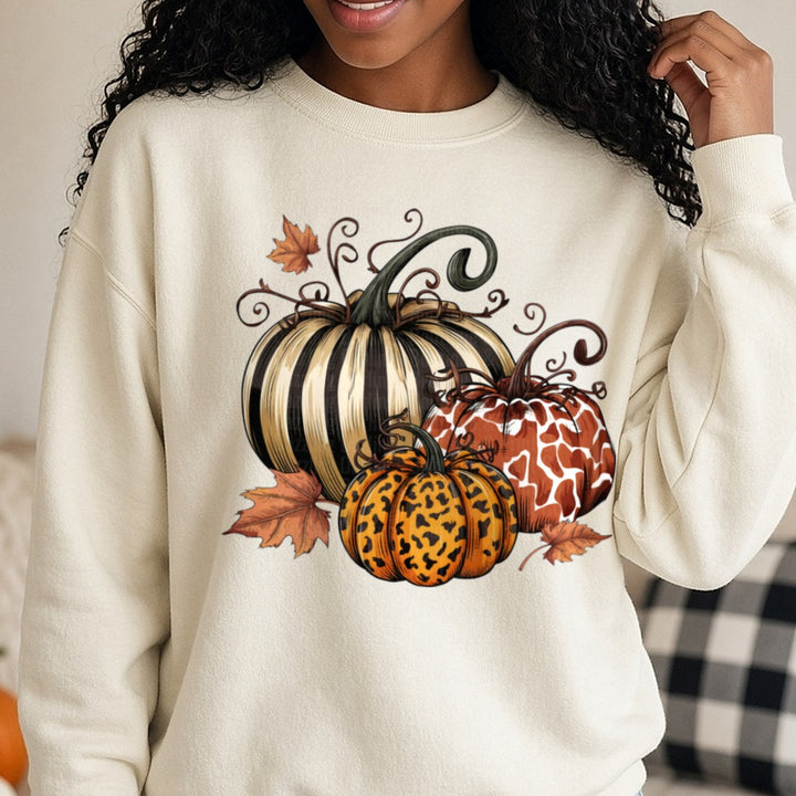 Halloween Fall Pumpkin Trio DTF transfer shown on a Comfort Colors sweatshirt