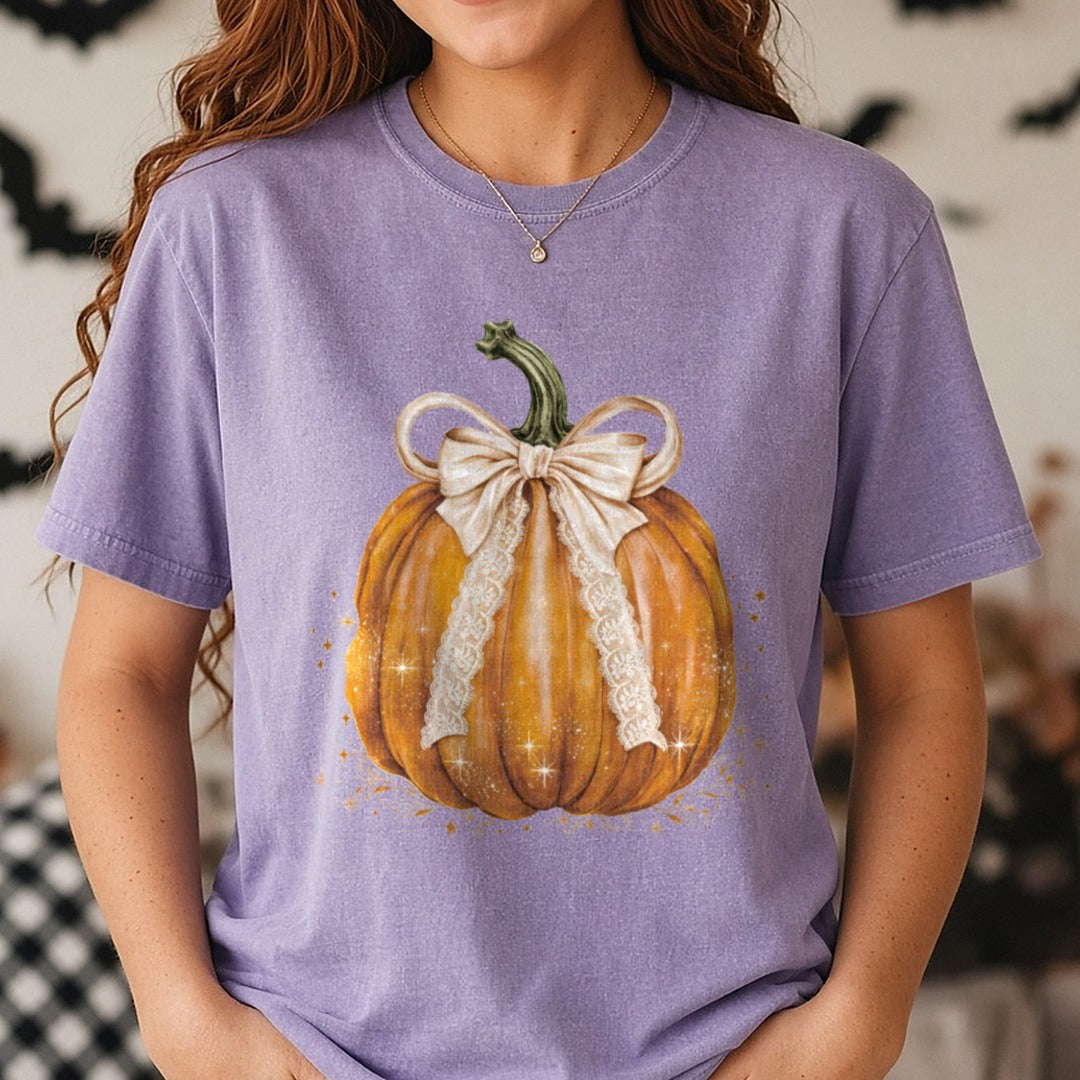 Halloween Fall Pumpkin Coquette Bow Golden Lace Sparkle DTF transfer shown on a Comfort Colors tee