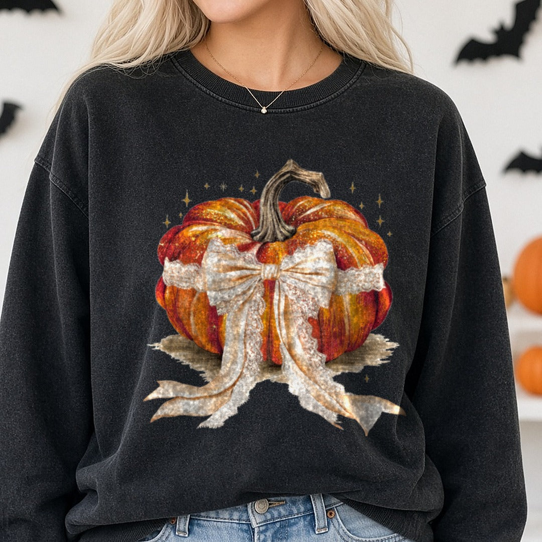 Halloween Fall Pumpkin Coquette Bow Orange Lace Wide DTF transfer shown on a Comfort Colors sweatshirt