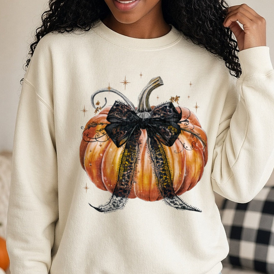 Halloween Fall Pumpkin Black Coquette Bow Lace Sparkle DTF transfer shown on a Comfort Colors sweatshirt