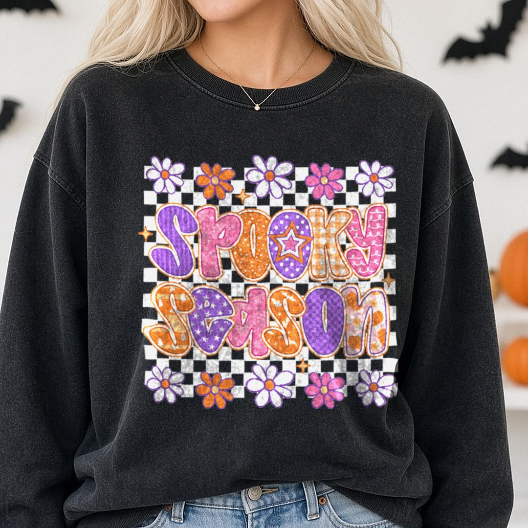 Halloween Fall Spooky Season Daisy Doodle Letters DTF transfer shown on a Comfort Colors sweatshirt