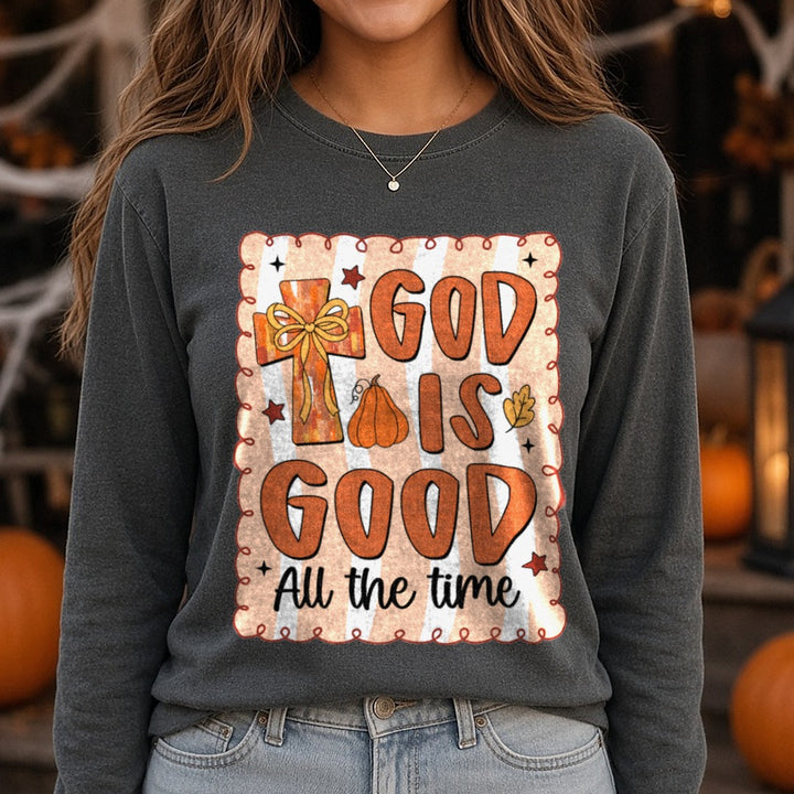 Halloween Fall God Is Good Fall DTF transfer shown on a Comfort Colors long sleeve tee