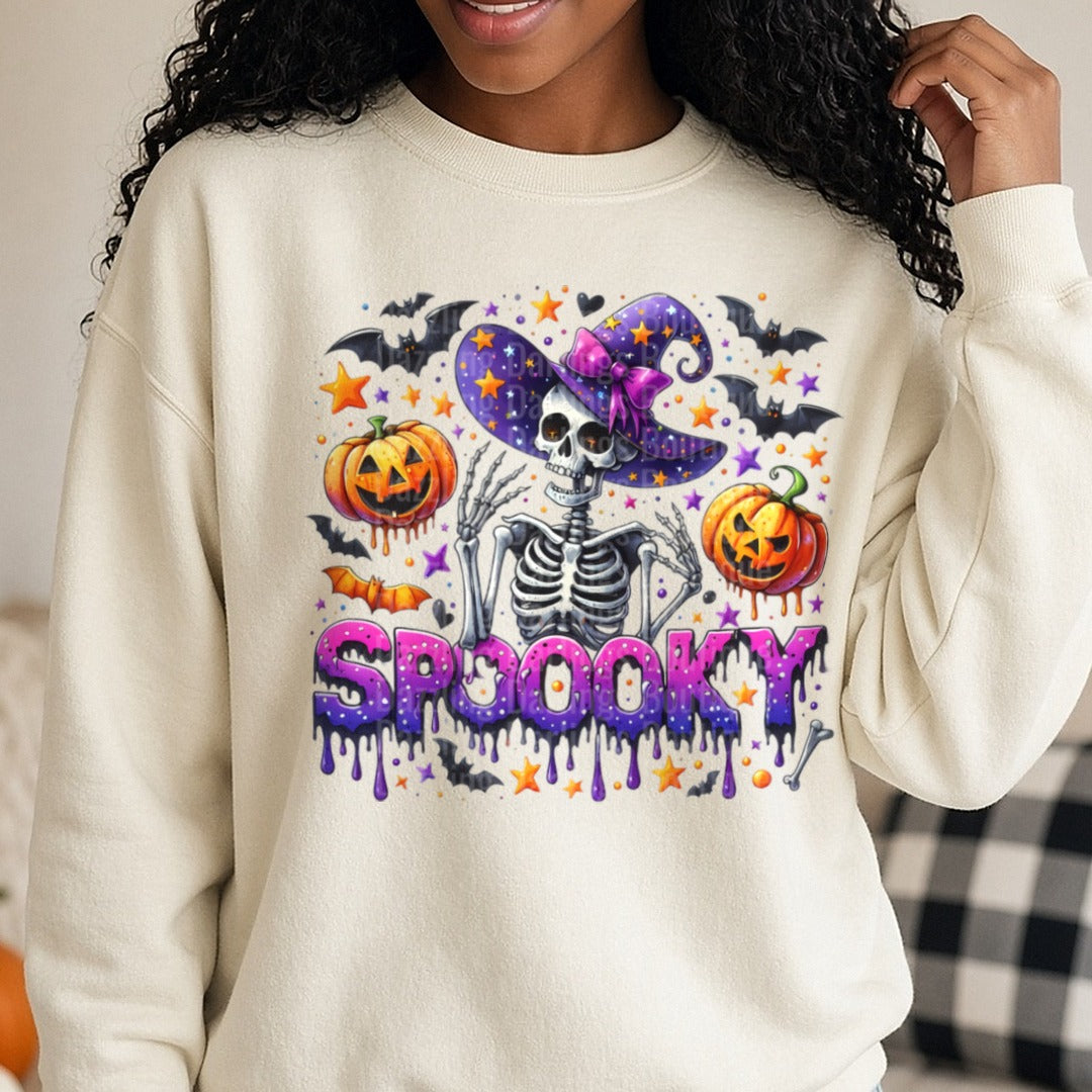 Halloween Fall Spooky Skeleton Witch DTF transfer shown on a Comfort Colors sweatshirt