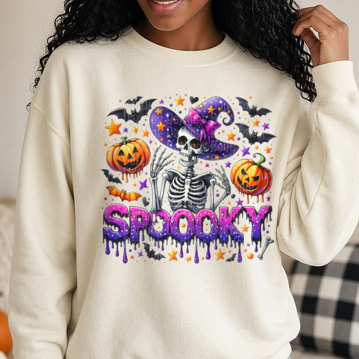Halloween Fall Spooky Skeleton Witch DTF transfer shown on a Comfort Colors sweatshirt