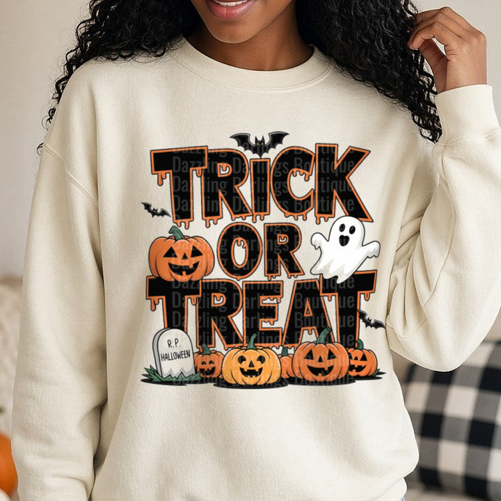 Halloween Fall Trick or Treat Pumpkin Ghost DTF transfer shown on a Comfort Colors sweatshirt
