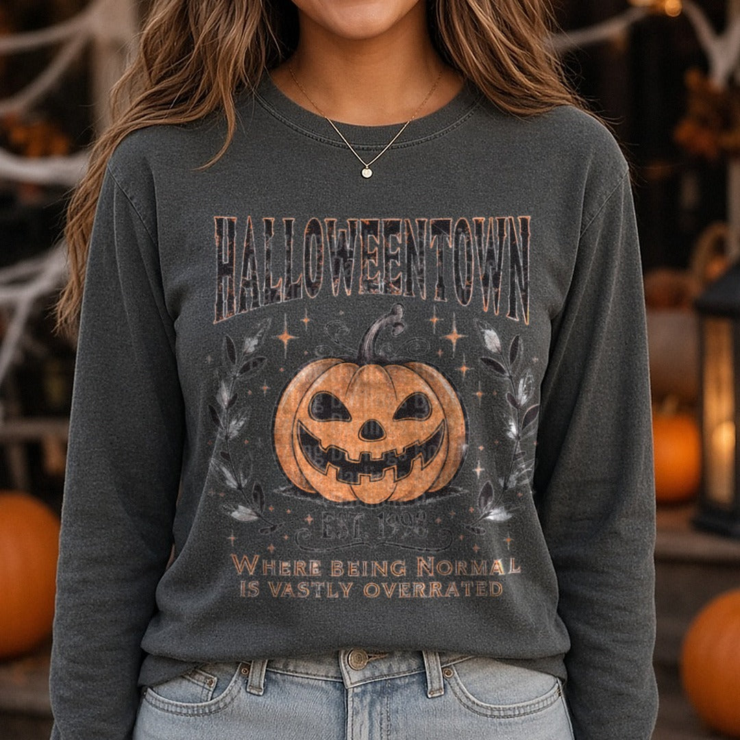 Halloween Fall Halloweentown Pumpkin DTF transfer shown on a Comfort Colors long sleeve tee