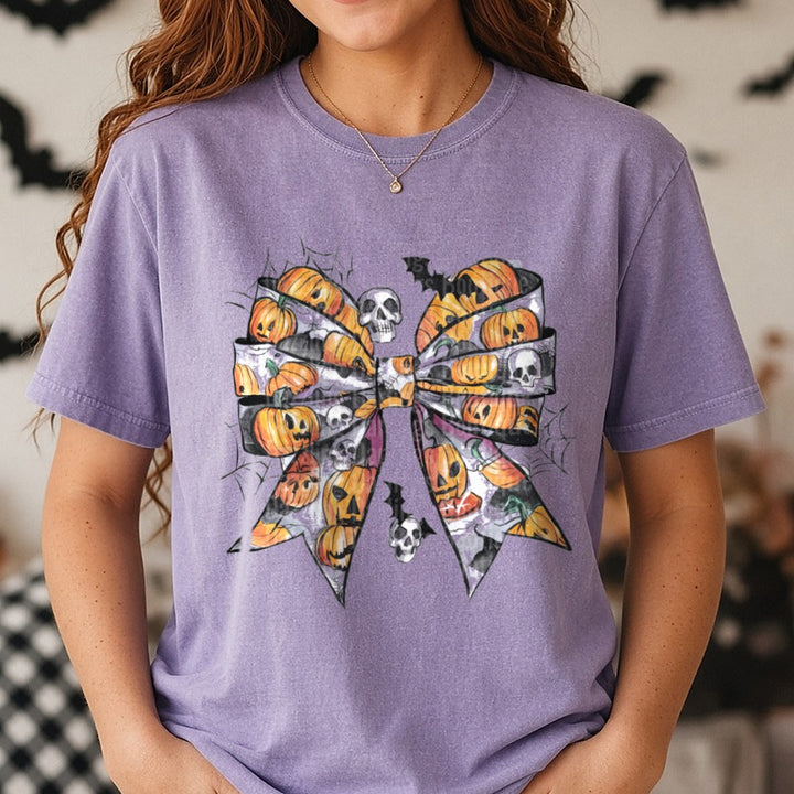 Halloween Fall Coquette Bow DTF transfer shown on a Comfort Colors tee