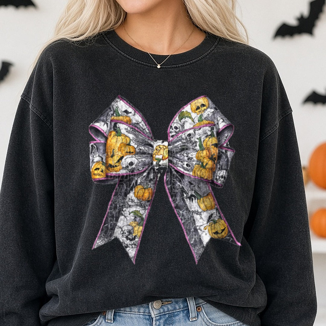 Halloween Fall Coquette Bow White Pink Edge Pumpkins DTF transfer shown on a Comfort Colors sweatshirt