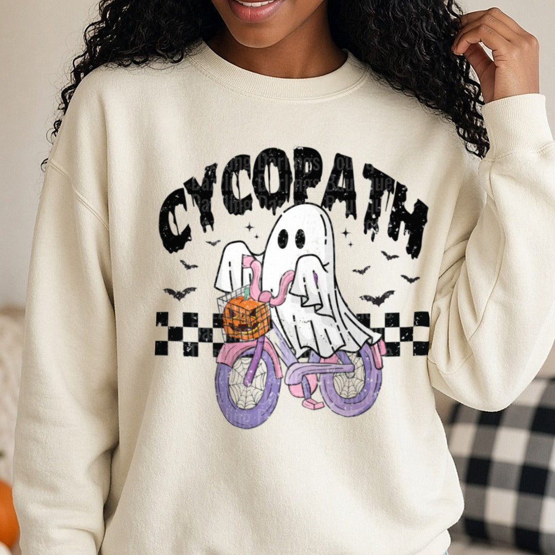 Halloween Fall Cycopath Ghost Bicycle DTF transfer shown on a Comfort Colors sweatshirt