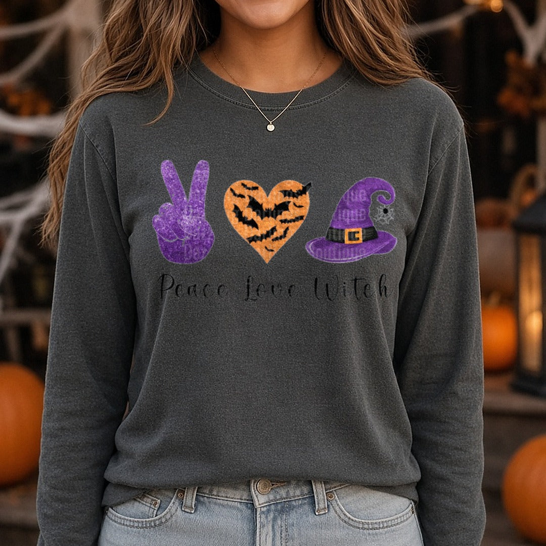 Halloween Fall Peace Love Witch DTF transfer shown on a Comfort Colors long sleeve tee
