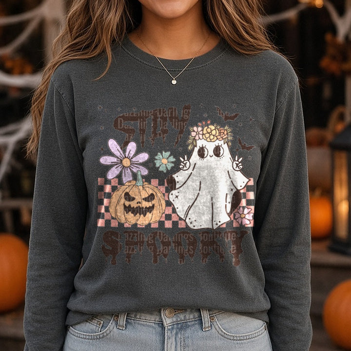 Halloween Fall Stat Spooky Pumpkin Ghost Retro DTF transfer shown on a Comfort Colors long sleeve tee