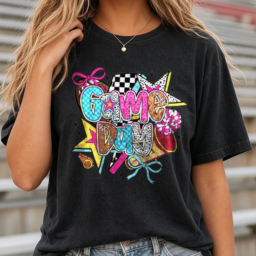 Game Day Football Cheer Pink Bows Checkered Lightning Bolt DTF transfer shown on a Comfort Colors tee