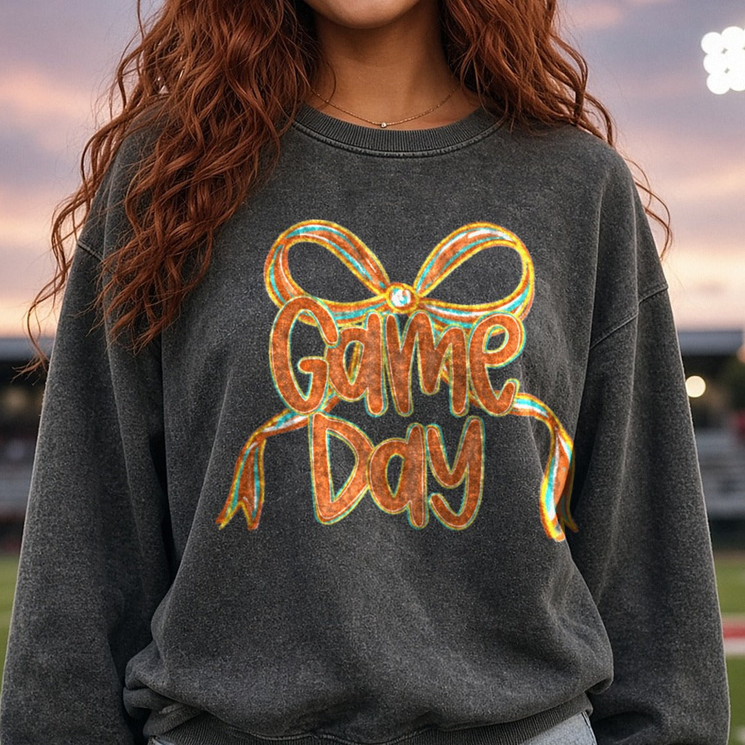 Game Day Orange Coquette Bow DTF transfer shown on a Comfort Colors sweatshirt