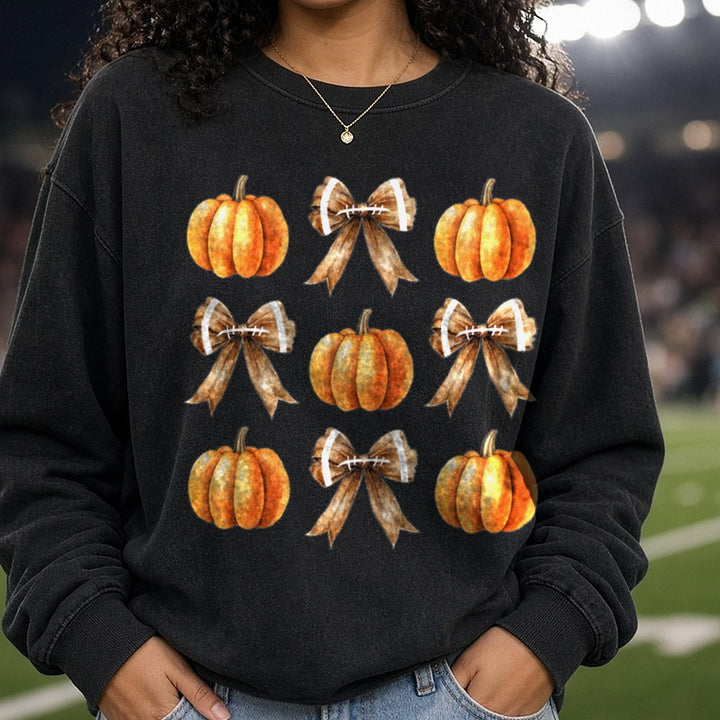 coquettepumpkinfootball DTF transfer shown on a Comfort Colors sweatshirt
