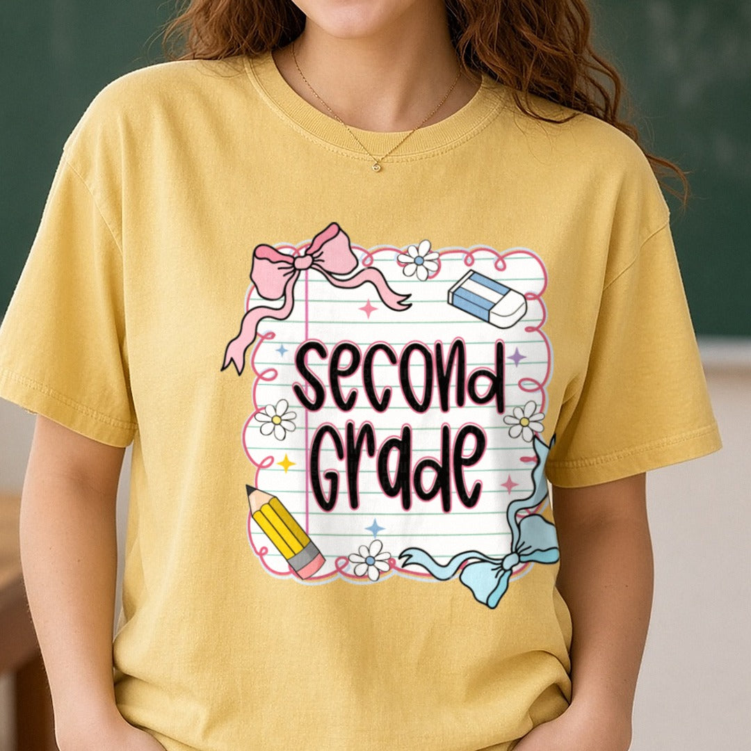 Second Grade Notebook Paper Pink Bow Pencil DTF transfer shown on a Comfort Colors tee