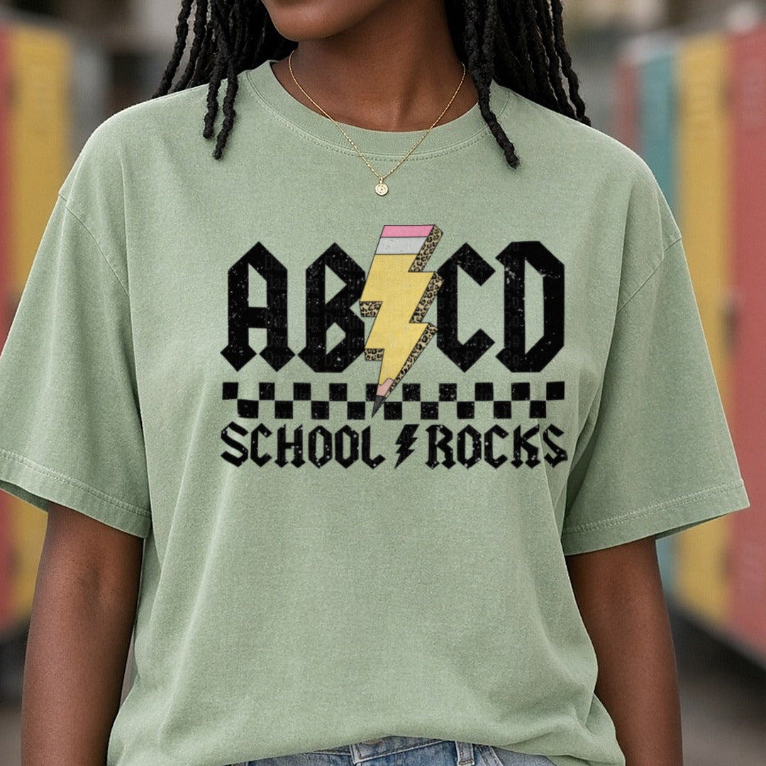 ABCD School Rocks Leopard DTF transfer shown on a Comfort Colors tee