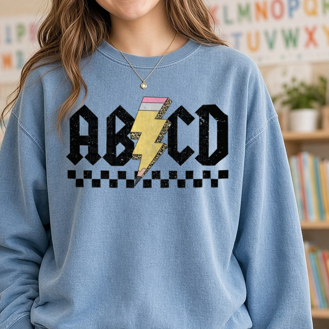 Abcd Rock DTF transfer shown on a Comfort Colors sweatshirt