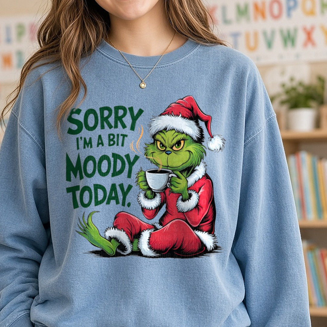 Sorry I'm a Bit Moody Today Green Guy DTF transfer shown on a Comfort Colors sweatshirt