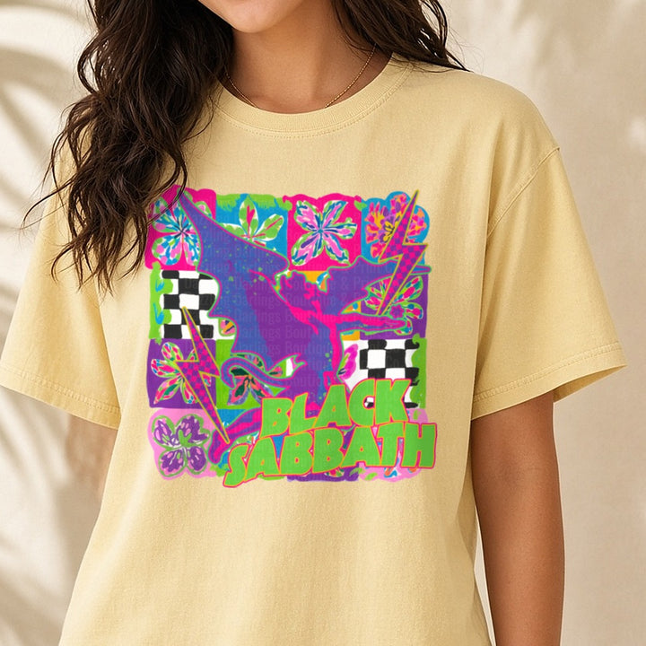 Rock Band Neon Winged Angel Green Letters DTF transfer shown on a Comfort Colors tee