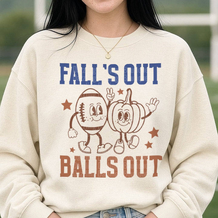 Football Fall's Out Balls Out DTF transfer shown on a Comfort Colors sweatshirt