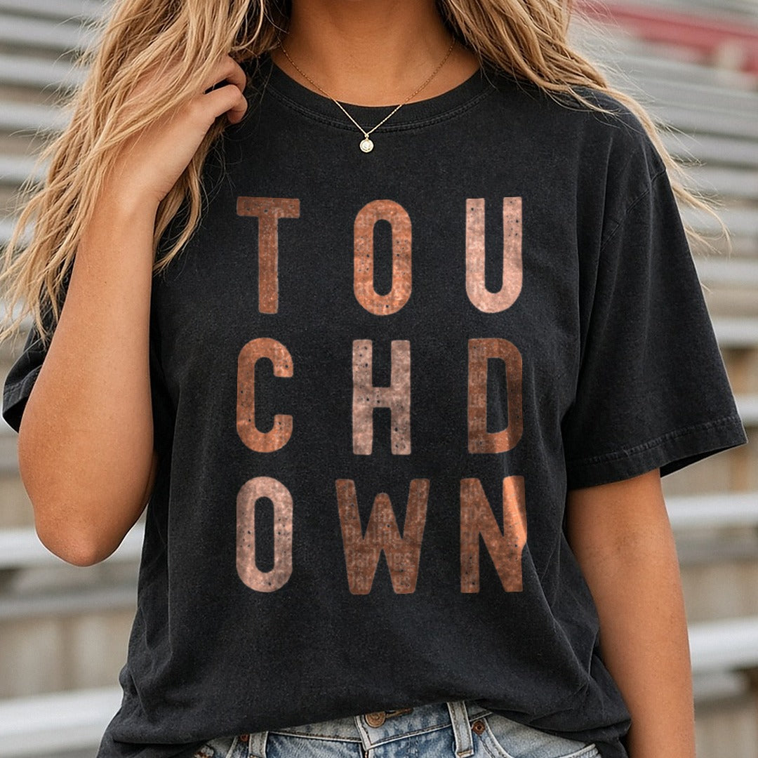 Football Touchdown Brown Stacked Distressed Letters DTF transfer shown on a Comfort Colors tee