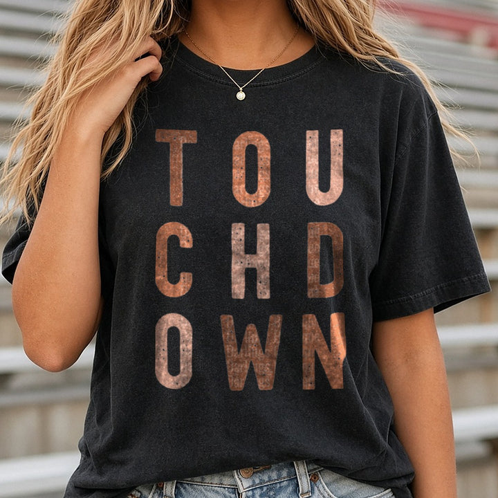 Football Touchdown Brown Stacked Distressed Letters DTF transfer shown on a Comfort Colors tee