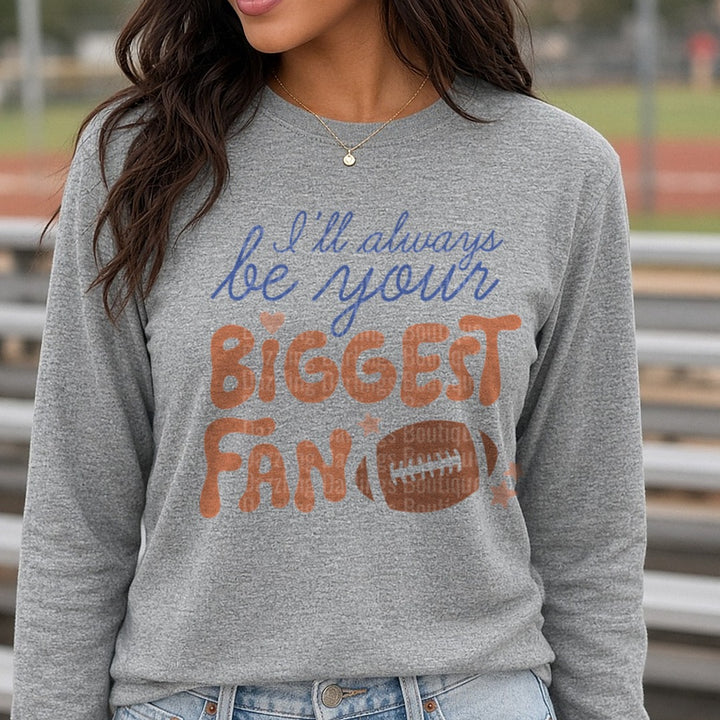 Football I'll Always Be Your Biggest Fan Brown DTF transfer shown on a Comfort Colors long sleeve tee