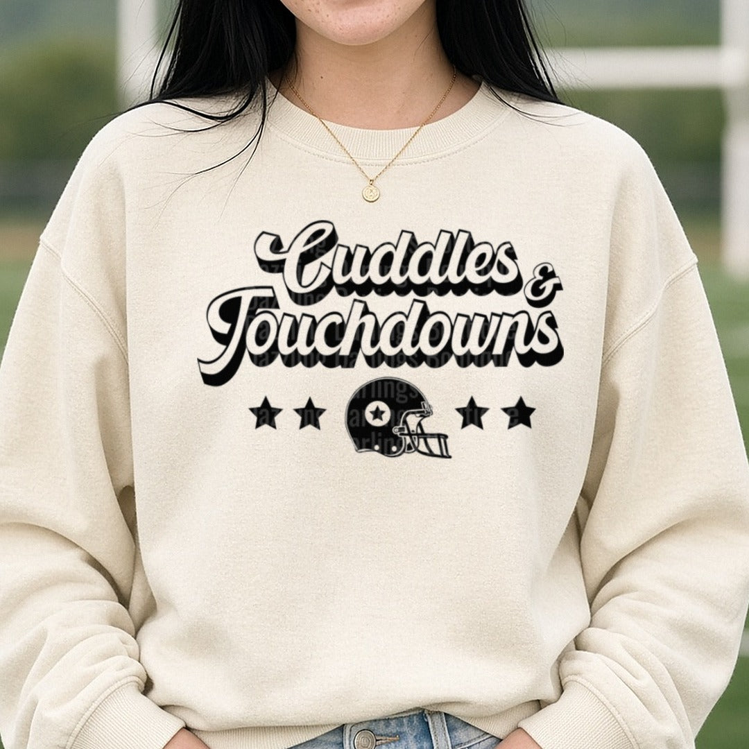 Football Cuddles and Touchdown Black DTF transfer shown on a Comfort Colors sweatshirt
