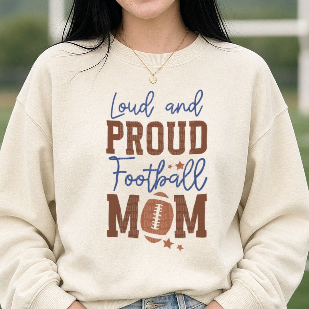 Football Loud and Proud Football Mom Brown DTF transfer shown on a Comfort Colors sweatshirt