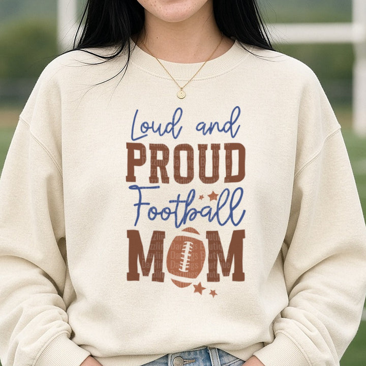 Football Loud and Proud Football Mom Brown DTF transfer shown on a Comfort Colors sweatshirt