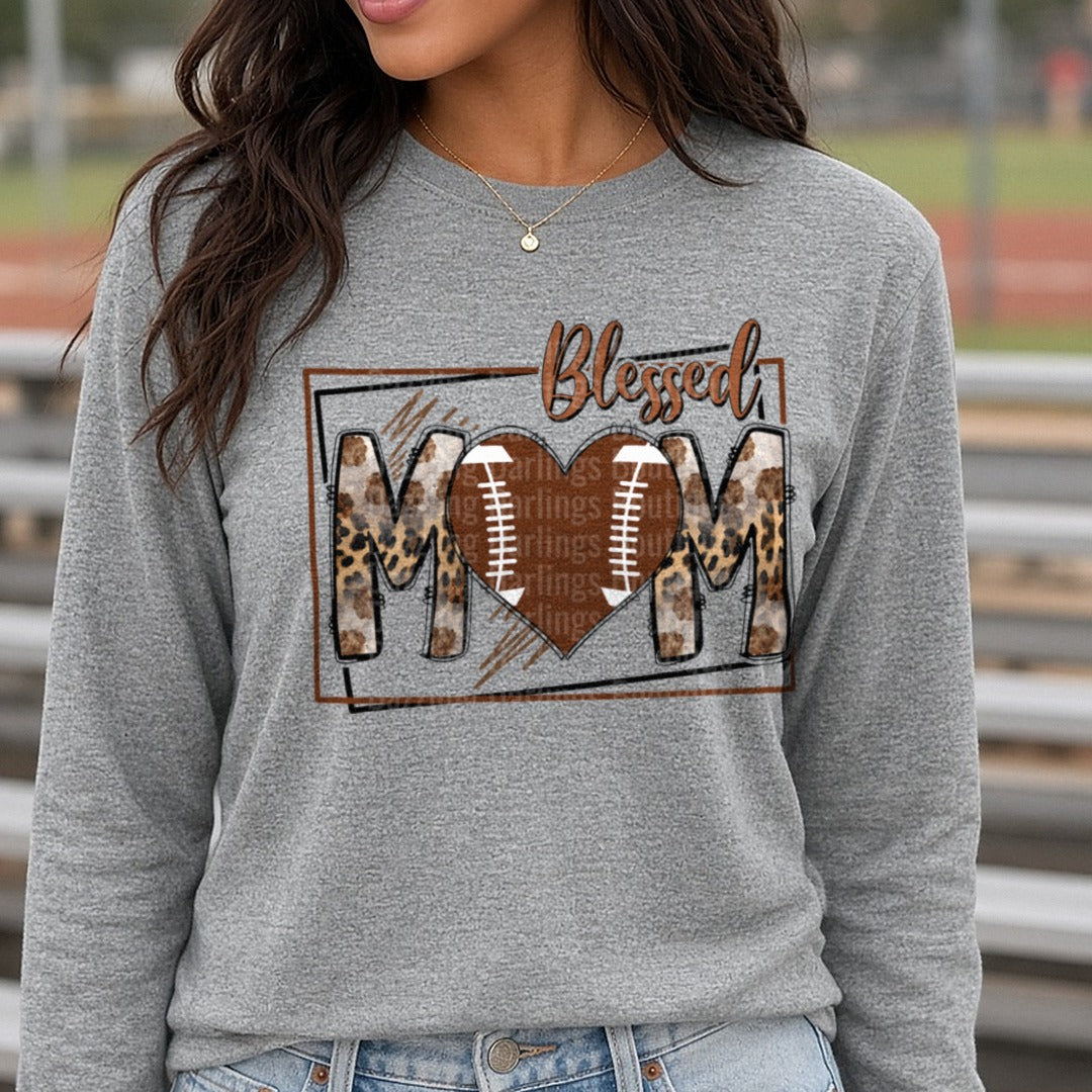Football Blessed Mom DTF transfer shown on a Comfort Colors long sleeve tee