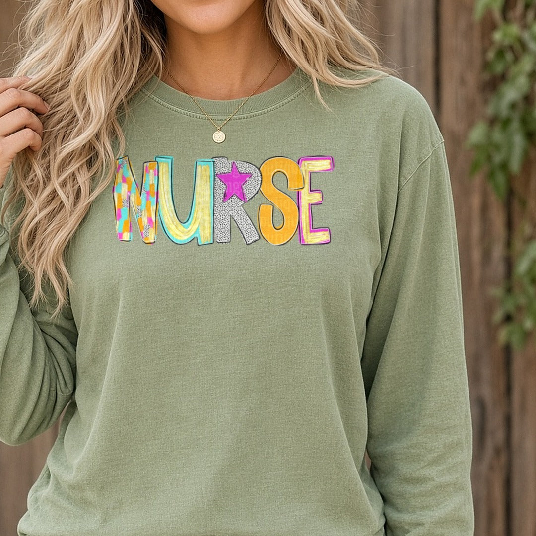 Colorful Retro Nurse Brushstroke Nurse DTF transfer shown on a Comfort Colors long sleeve tee