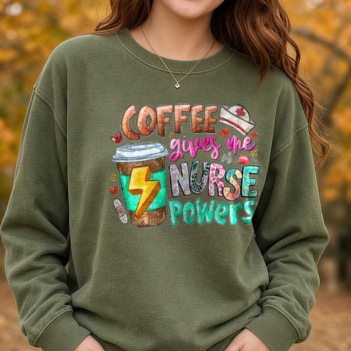 Coffee Gives Me Nurse Powers DTF transfer shown on a Comfort Colors sweatshirt