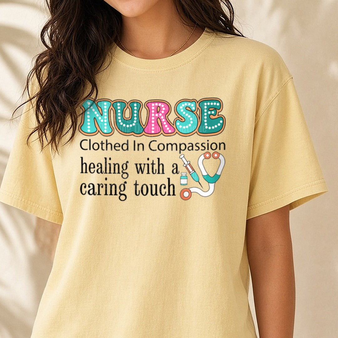Nurse Clothed in Compassion Healing with a Caring Touch DTF transfer shown on a Comfort Colors tee