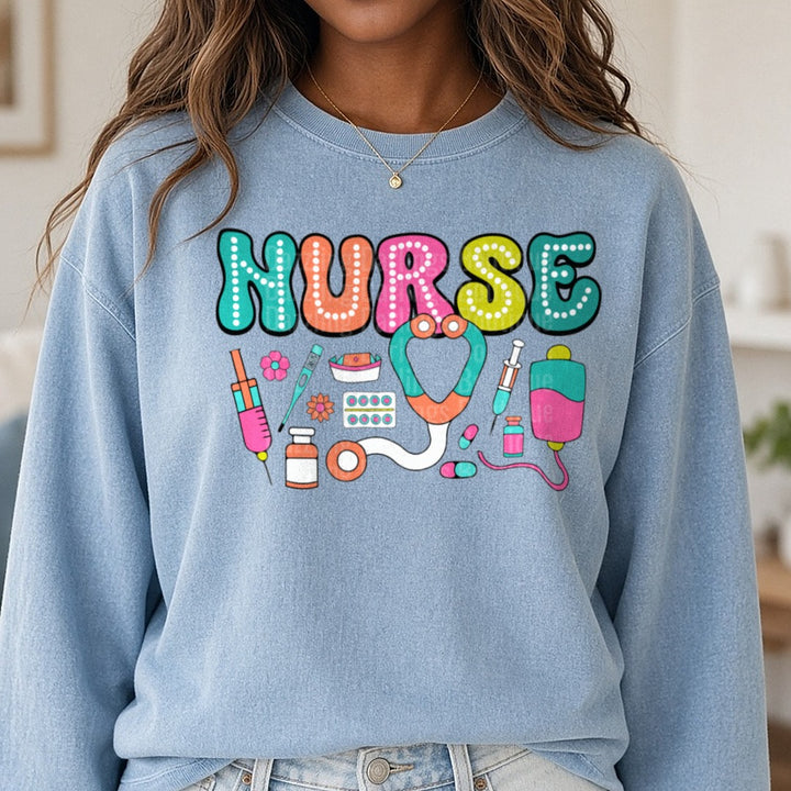 Nurse Neon Marquee Letters Stethoscope Medical Icons DTF transfer shown on a Comfort Colors sweatshirt